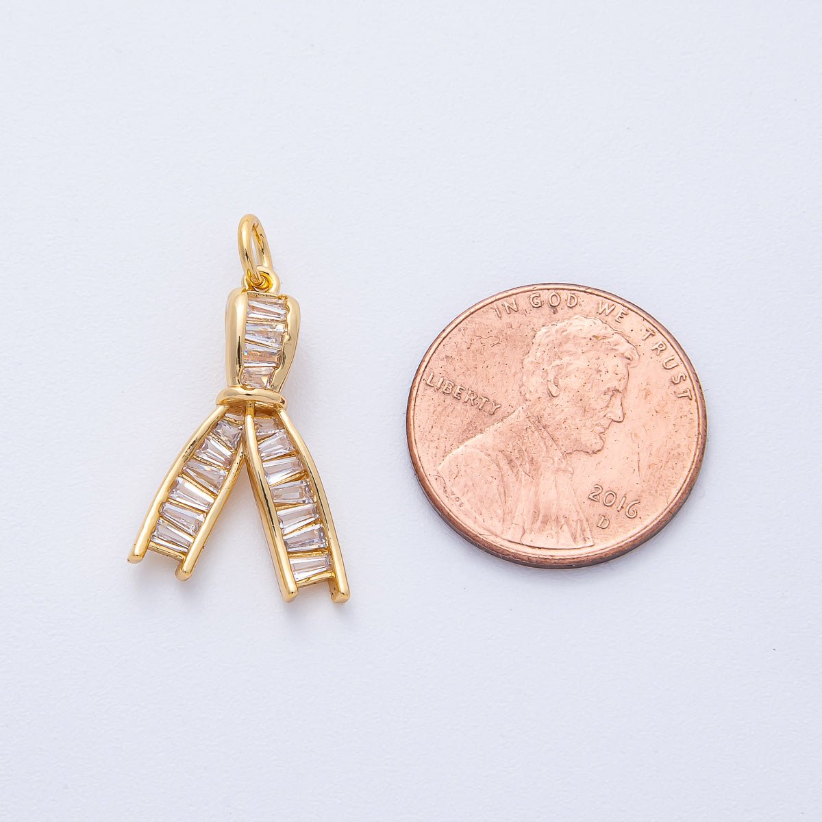 18K Gold Filled 21mm Clear Baguette CZ Ribbon Knot Charm | AK189 - DLUXCA
