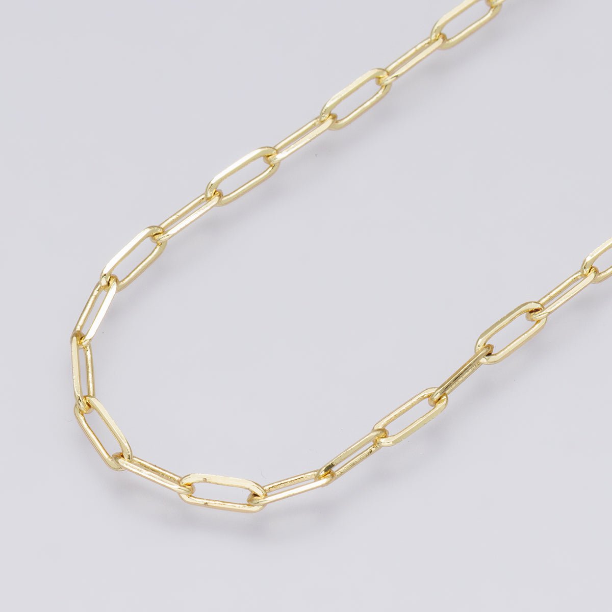 24K Gold Filled 6.4mm x 2.4mm Minimalist Paperclip Unfinished Chain by Yard | Roll - 00575 - DLUXCA