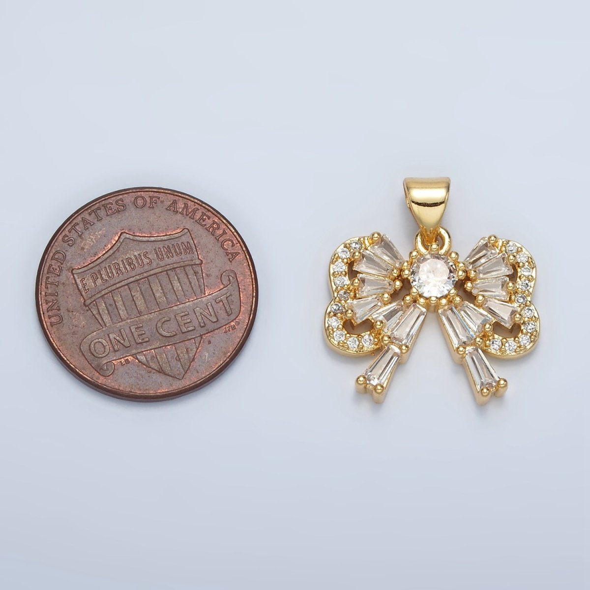 24K Gold Filled Bow Ribbon Baguette Micro Paved CZ Pendant | I274 - DLUXCA