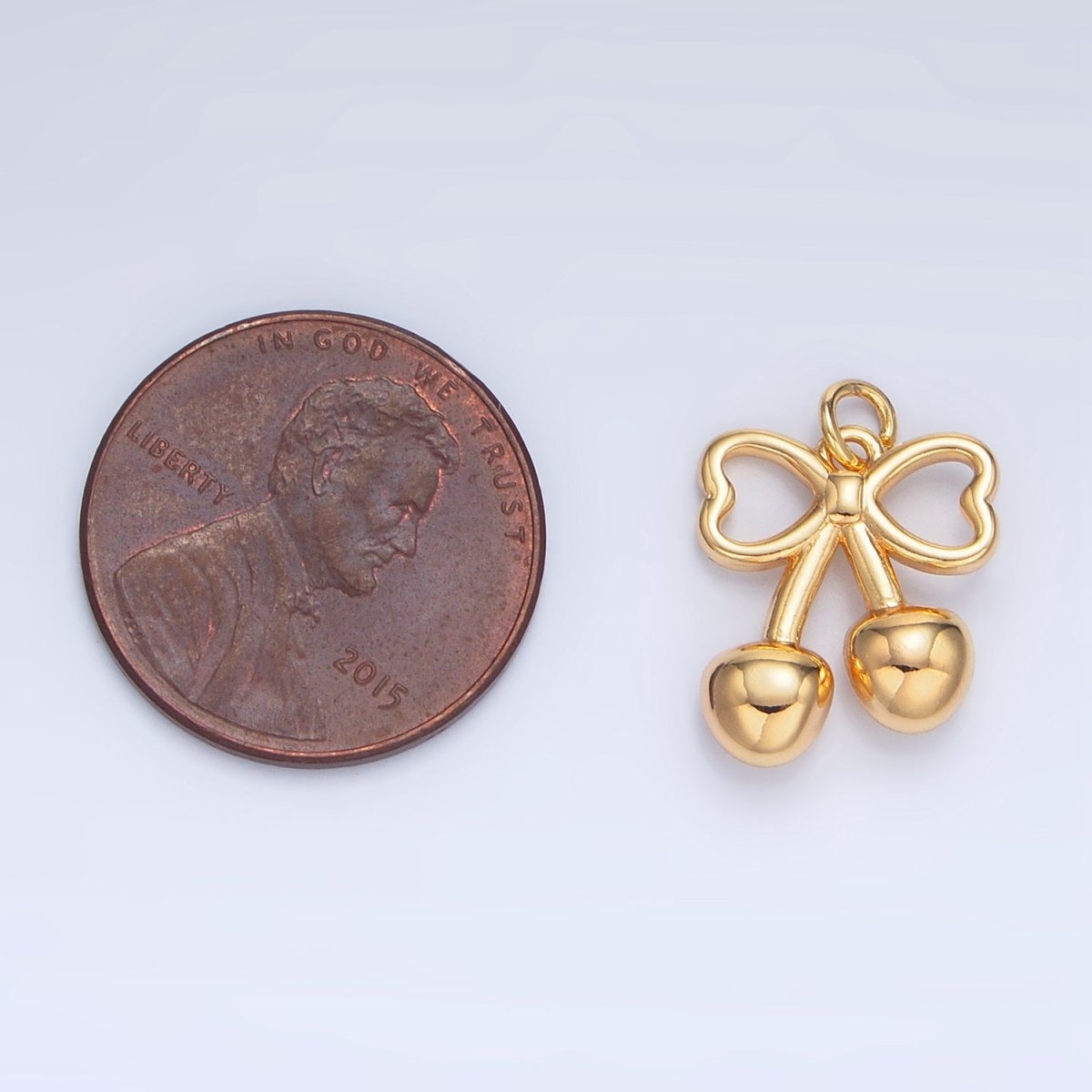 24K Gold Filled Mini Cherry Bow Ribbon Charm in Gold & Silver | N1345 - DLUXCA