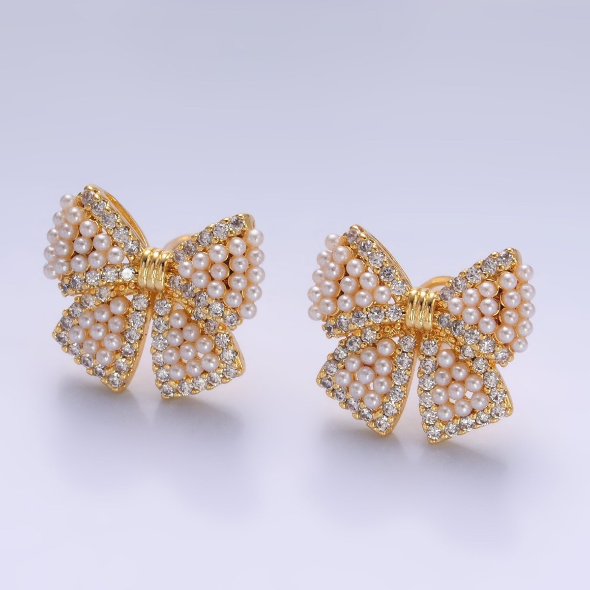24K Gold Filled Shell Pearl Dotted Micro Paved CZ Ribbon Bow Stud Earrings in Gold & Silver | AB692 AB693 - DLUXCA