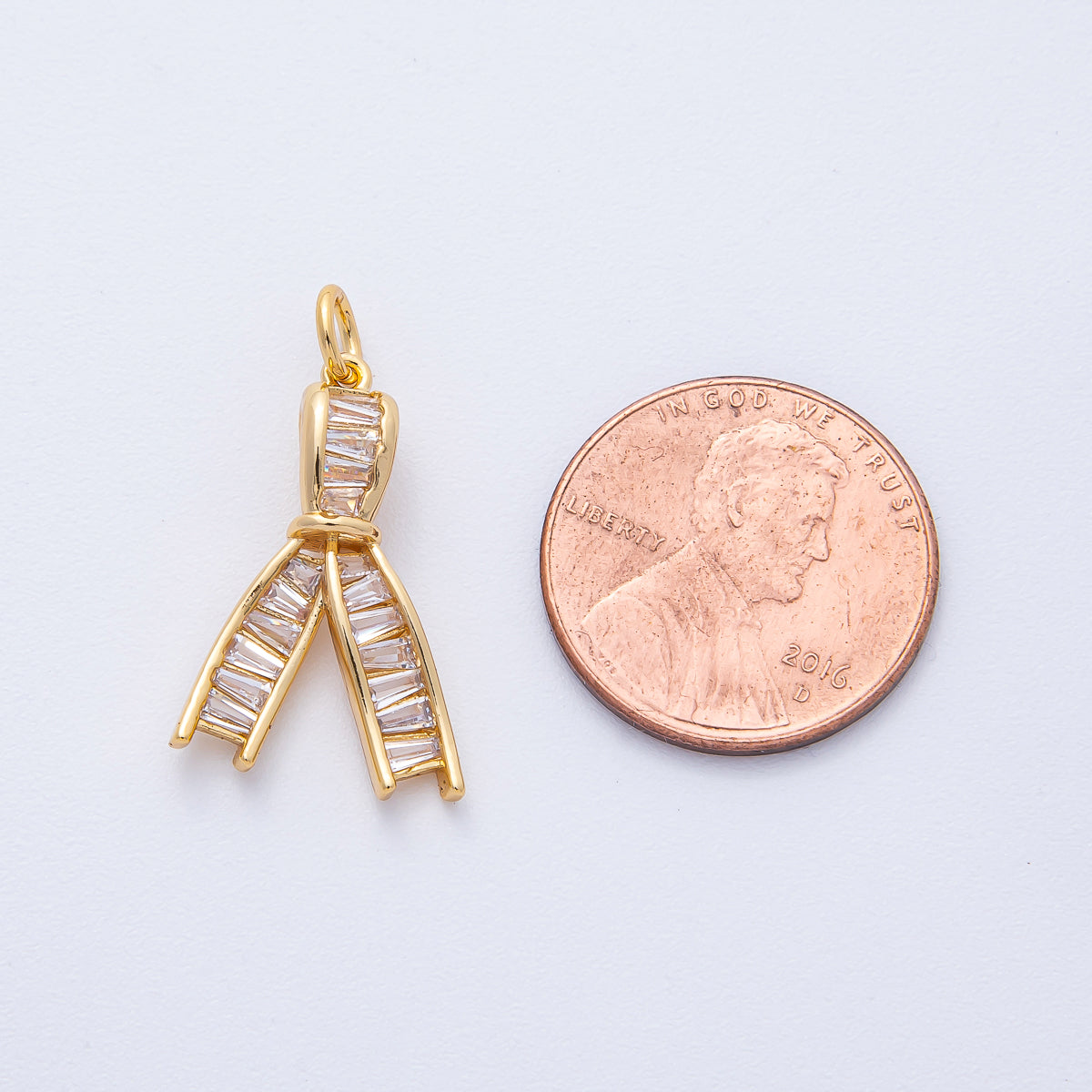 18K Gold Filled 21mm Clear Baguette CZ Ribbon Knot Charm | AK189