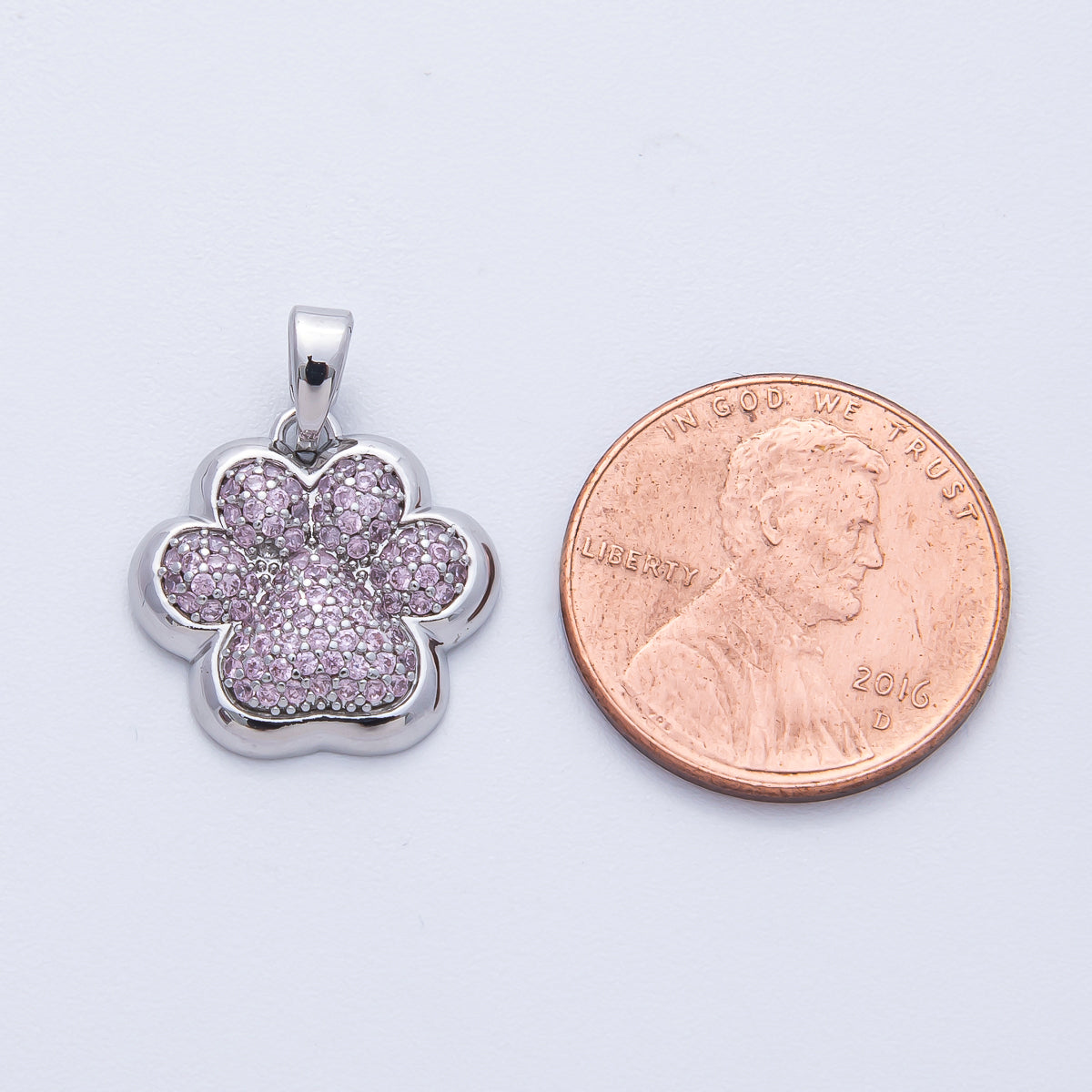 Rhodium Plated Pink Micro Paved CZ Animal Paw Print Pendant | H048