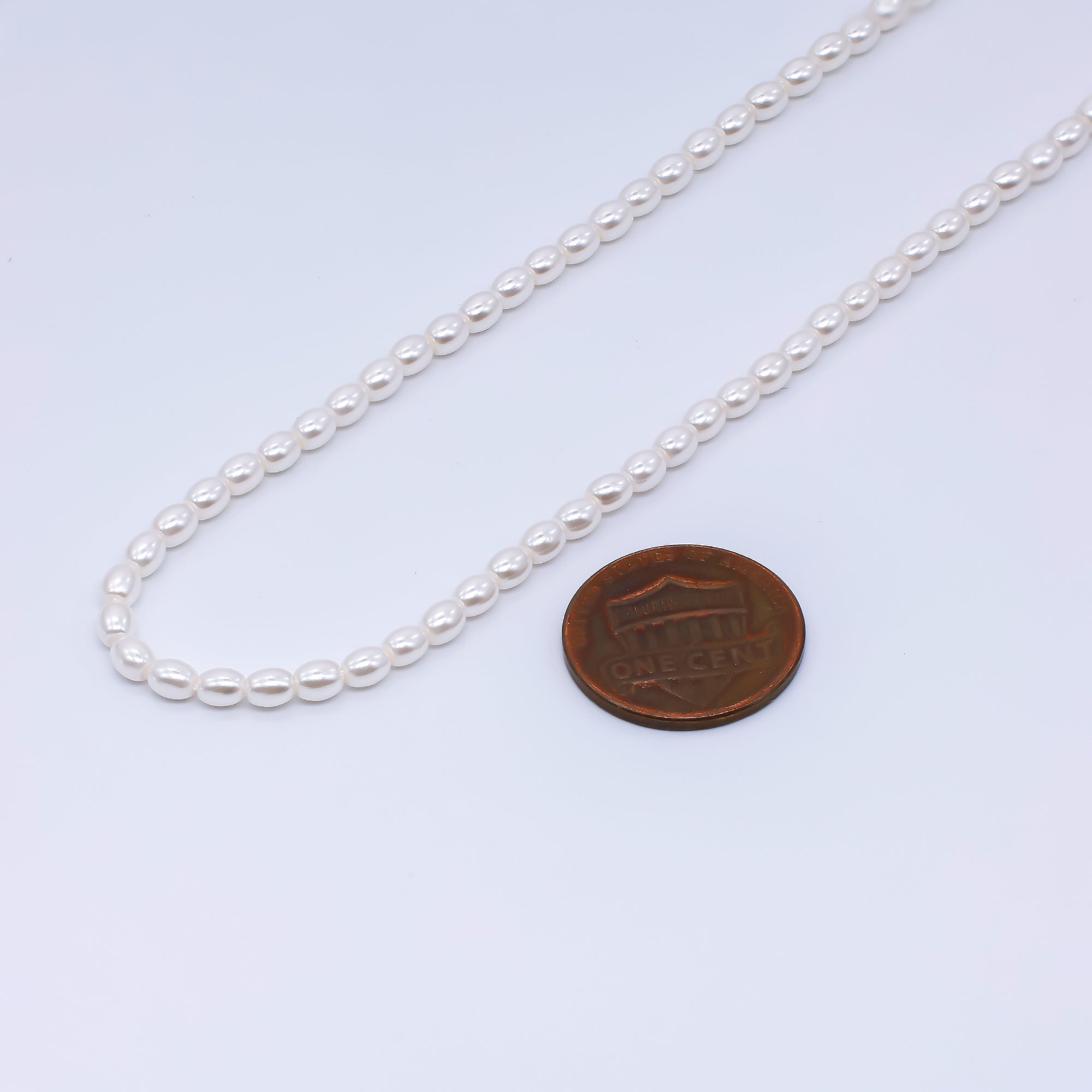 3mm White Oval Shell Pearl Strand Finding | WA-03168