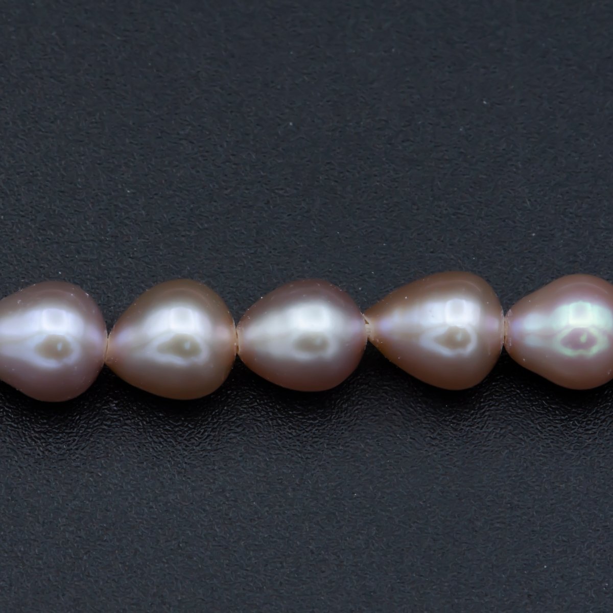 AAA 5.5mm Pink Champagne rice freshwater pearl teardrop pearl per Strand Wholesale Bulk | WA-564 Clearance Pricing - DLUXCA
