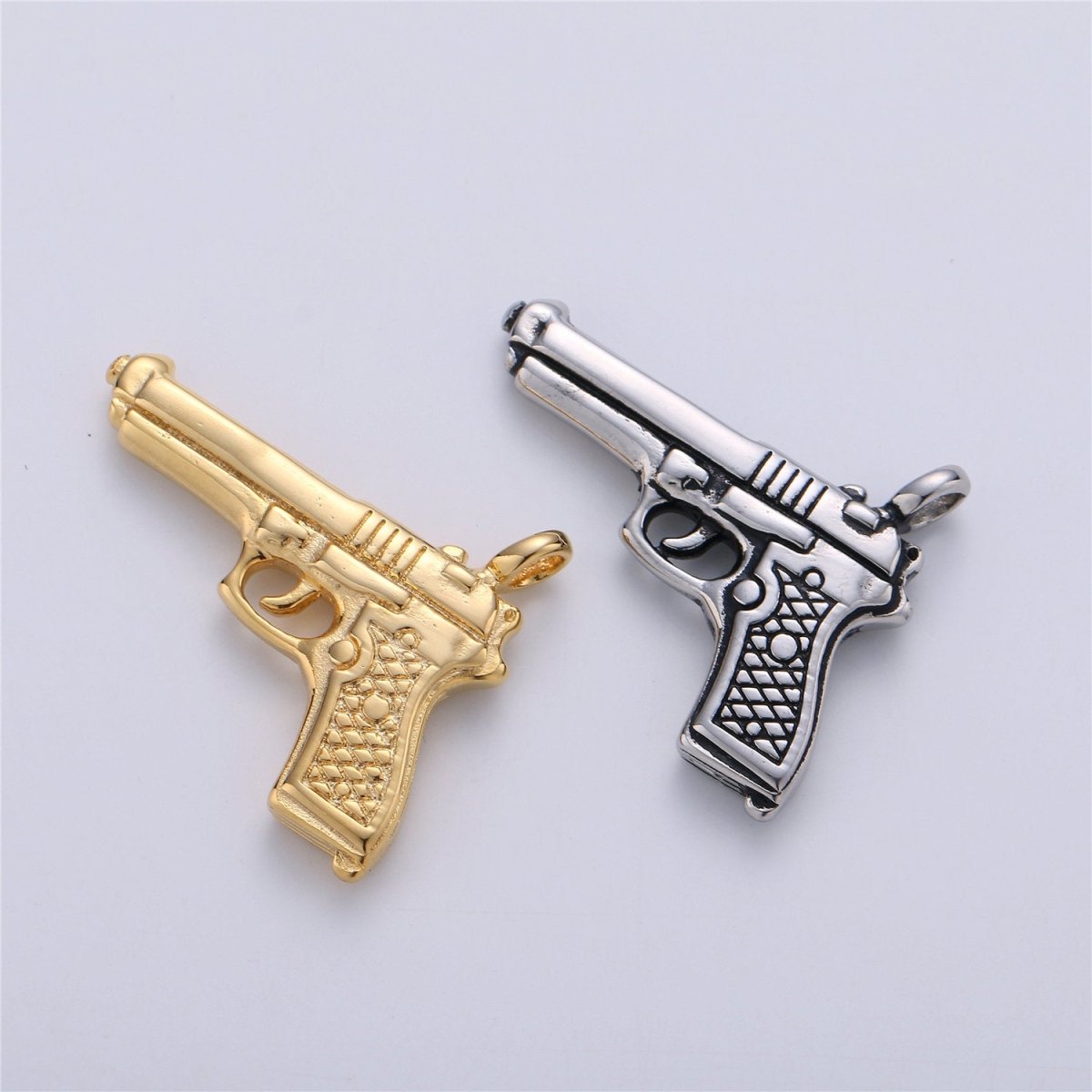 PISTOL CHARM GOLD PISTOL CHARM GOLD