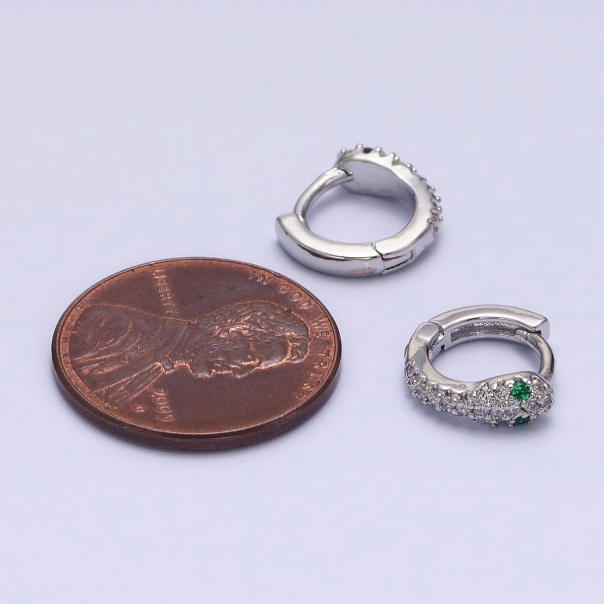 White Gold-Filled Green-Eyed Micro Paved 10mm Cartilage Huggie Earrings | AB1547 - DLUXCA