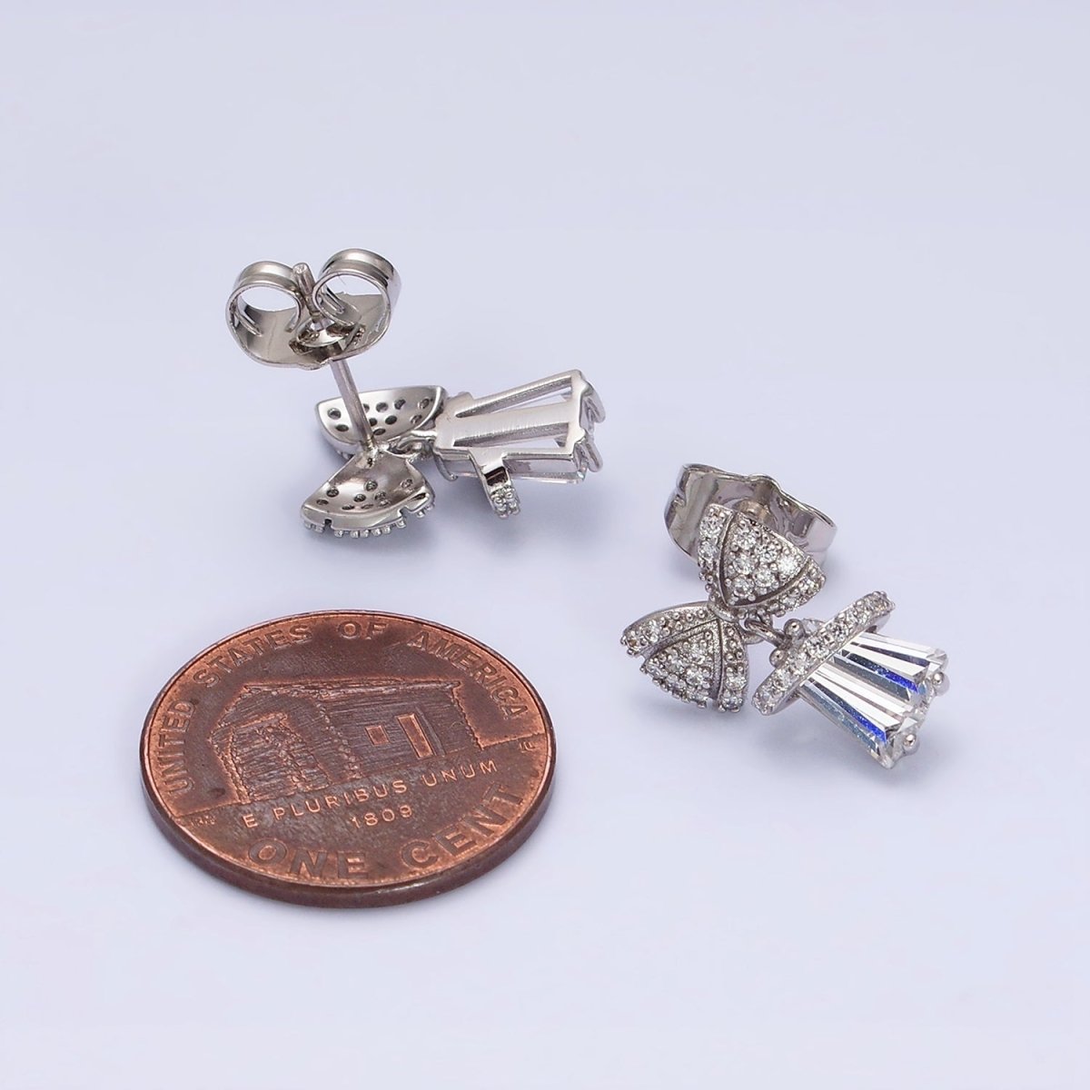 White Gold Filled Micro Paved CZ Ribbon Clear Baguette Bell Stud Earrings | AD1454 - DLUXCA