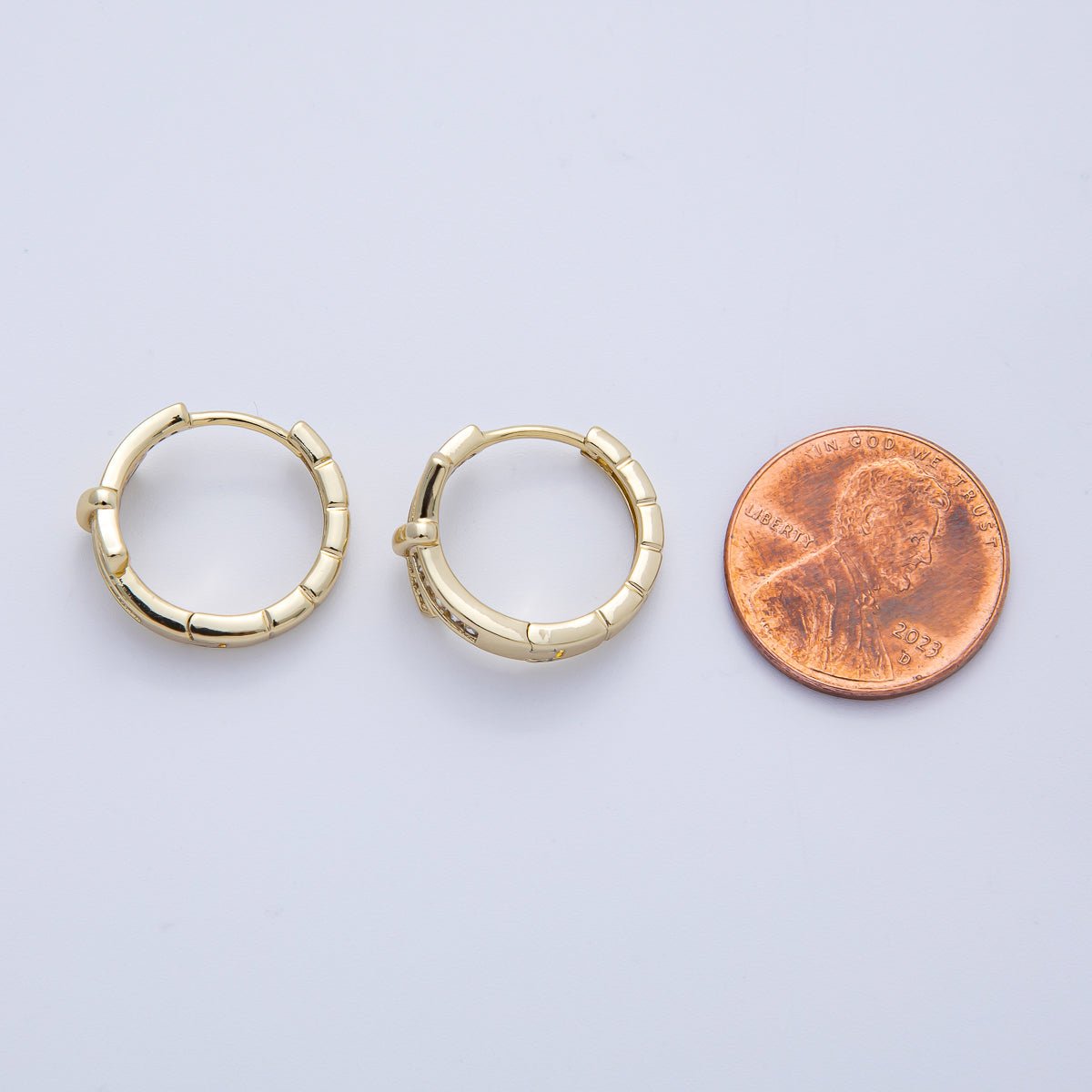 14K Gold Filled 18mm Baguette Micro Paved CZ Ribbed Knot Tied Huggie Earrings | Earrings - 00065 - DLUXCA