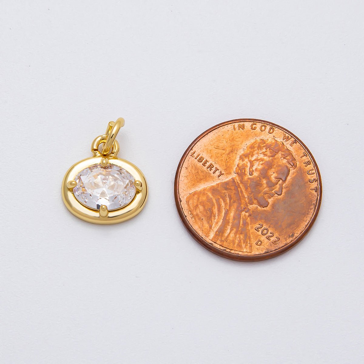 16K Gold Filled 11.5mm Clear CZ Bezel Oval Solitaire Mini Charm | Charms - 00472 - DLUXCA
