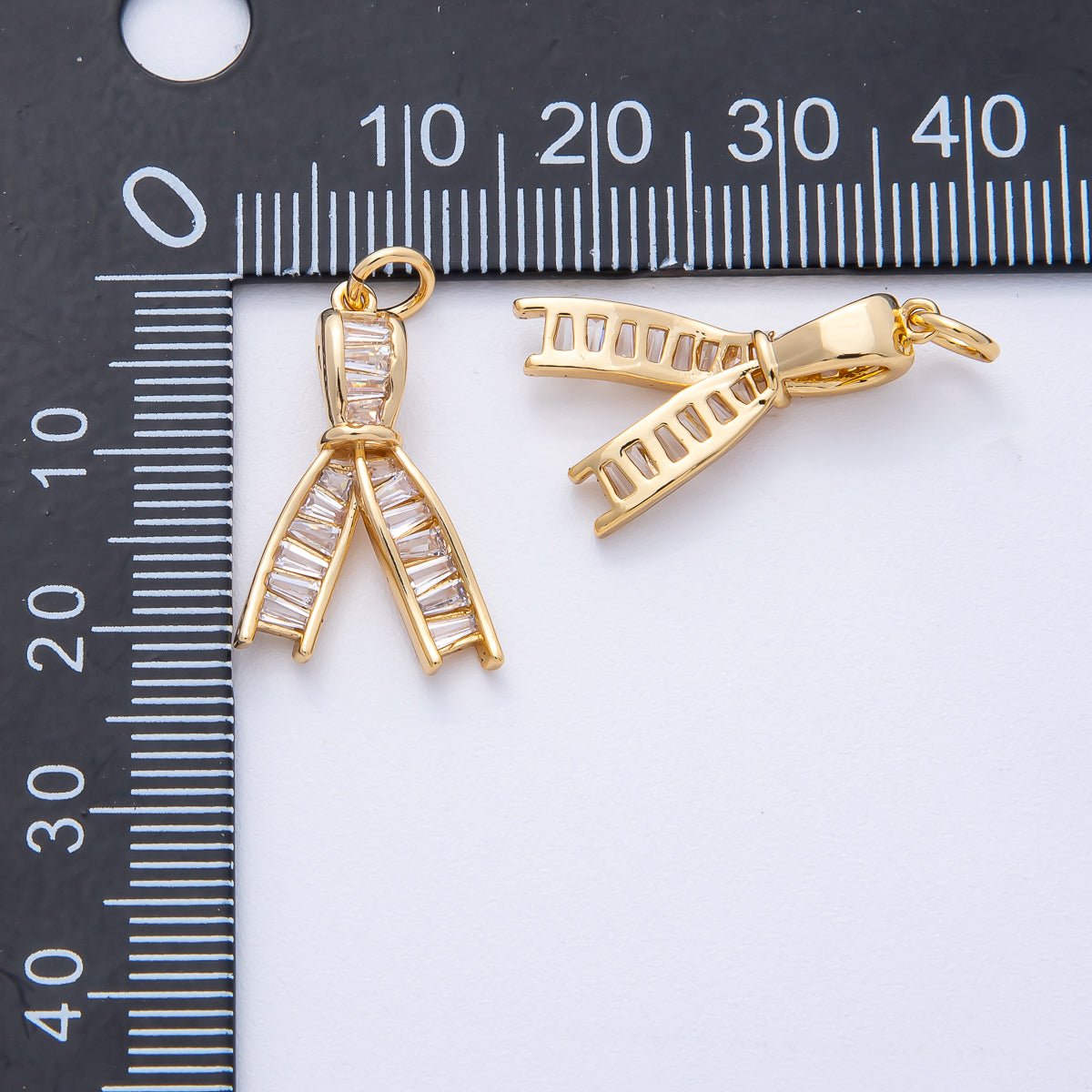 18K Gold Filled 21mm Clear Baguette CZ Ribbon Knot Charm | AK189 - DLUXCA