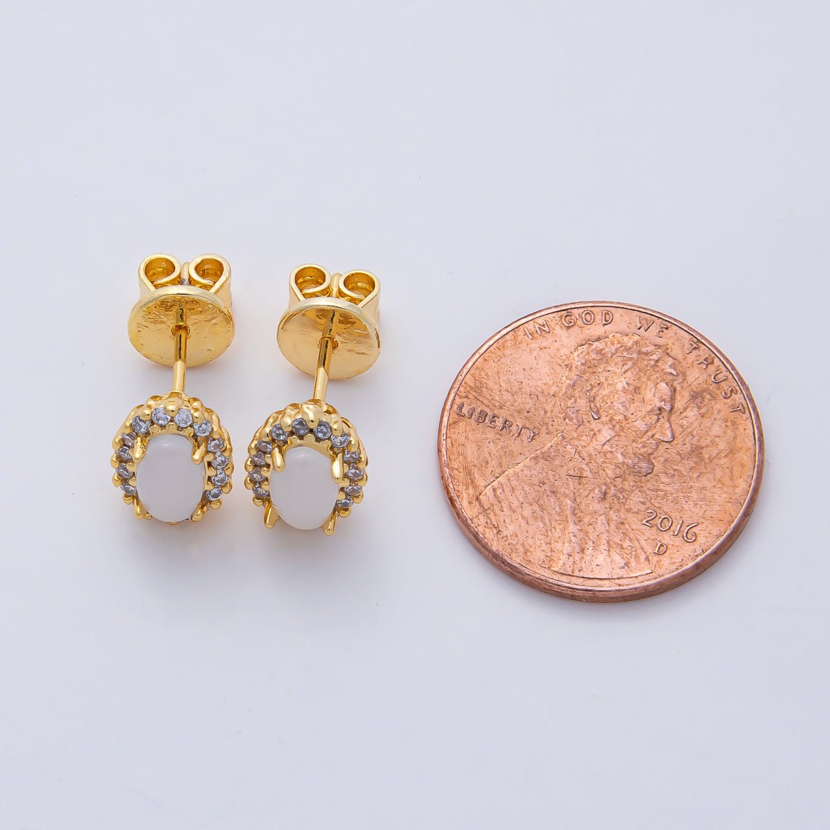 18K Gold Filled White Micro Paced CZ Oval Stud Earrings | AD1660 - DLUXCA