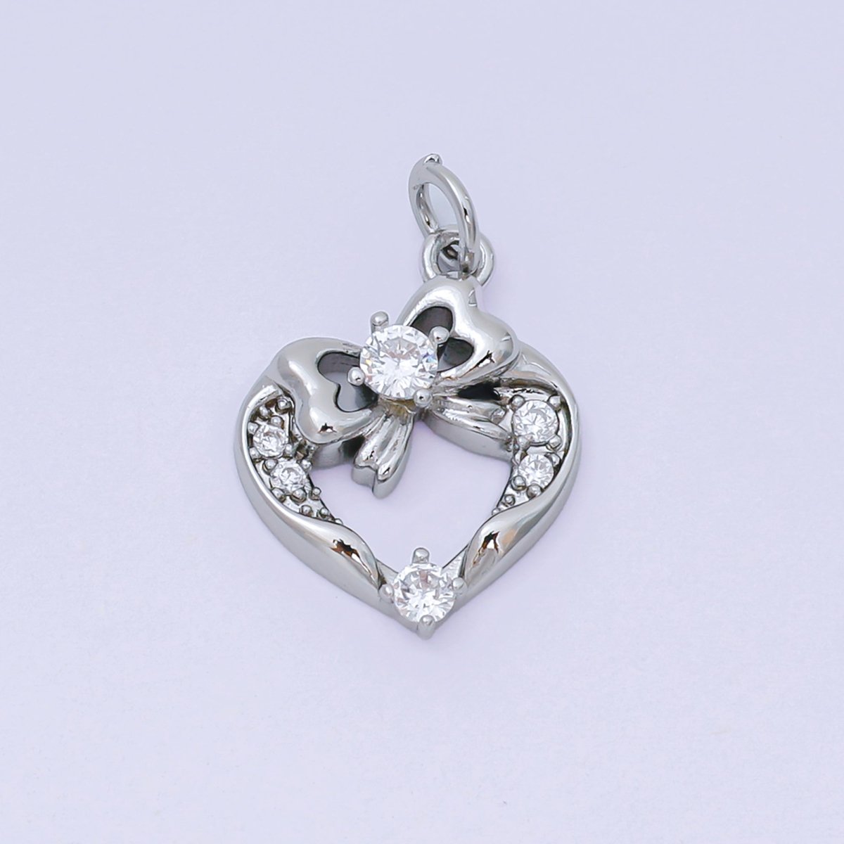 24K Gold Filled 17.5mm Micro Paved CZ Ribbon Bow Open Heart Charm in Gold & Silver | AJ472 - DLUXCA