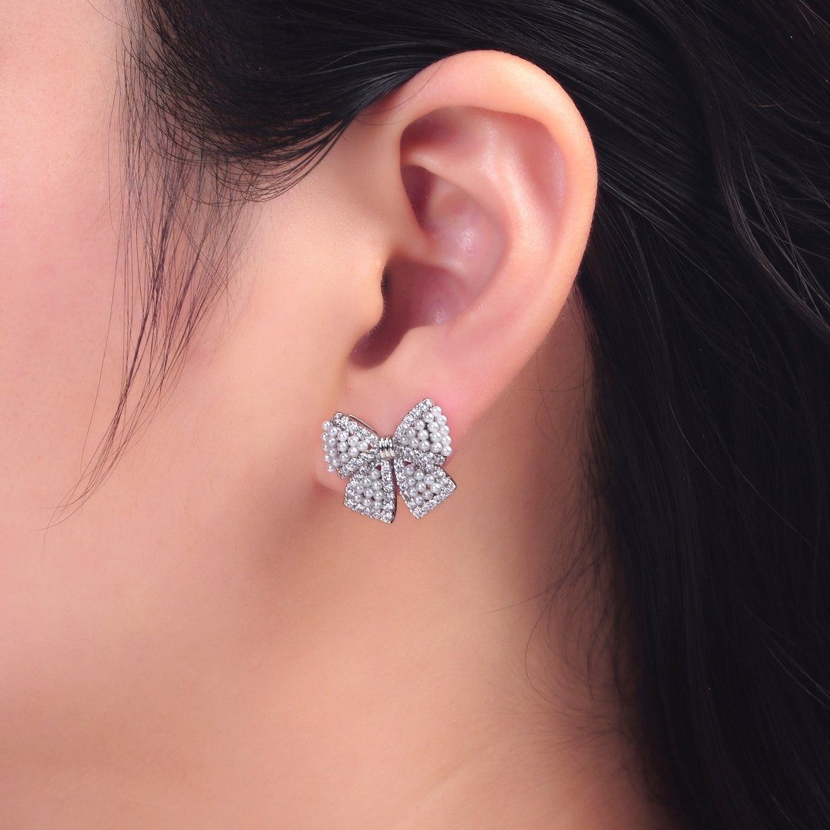 24K Gold Filled Shell Pearl Dotted Micro Paved CZ Ribbon Bow Stud Earrings in Gold & Silver | AB692 AB693 - DLUXCA