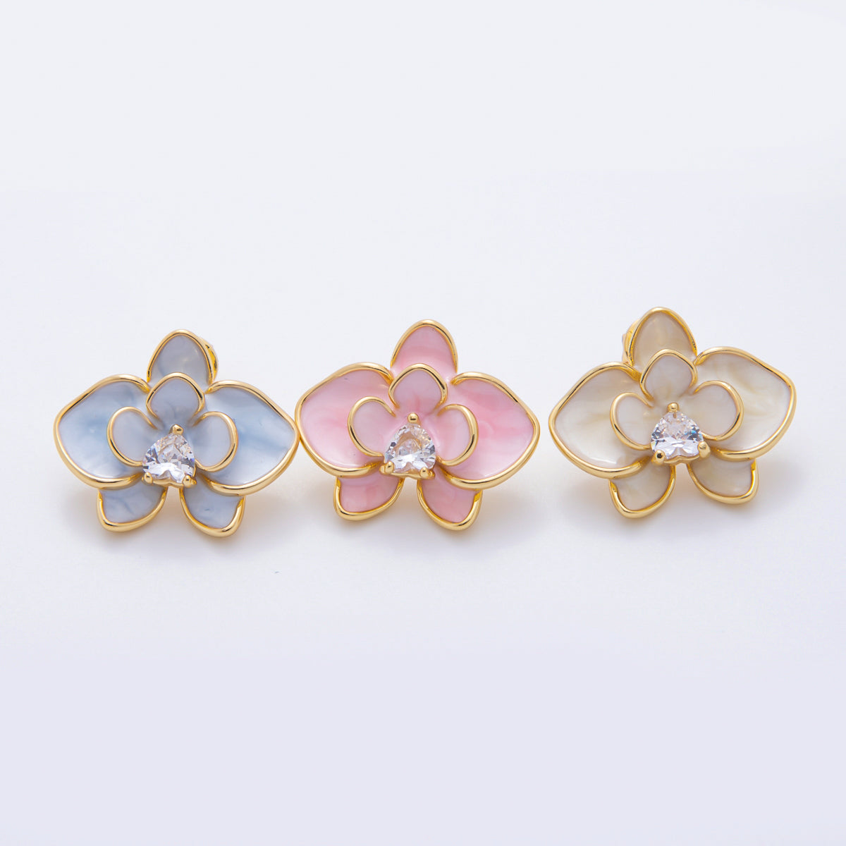 18K Gold Filled Heart-Shaped CZ Enamel Bloom Orchid Floral Studs Earrings in White, Blue, & Pink | AJ195 - AJ197
