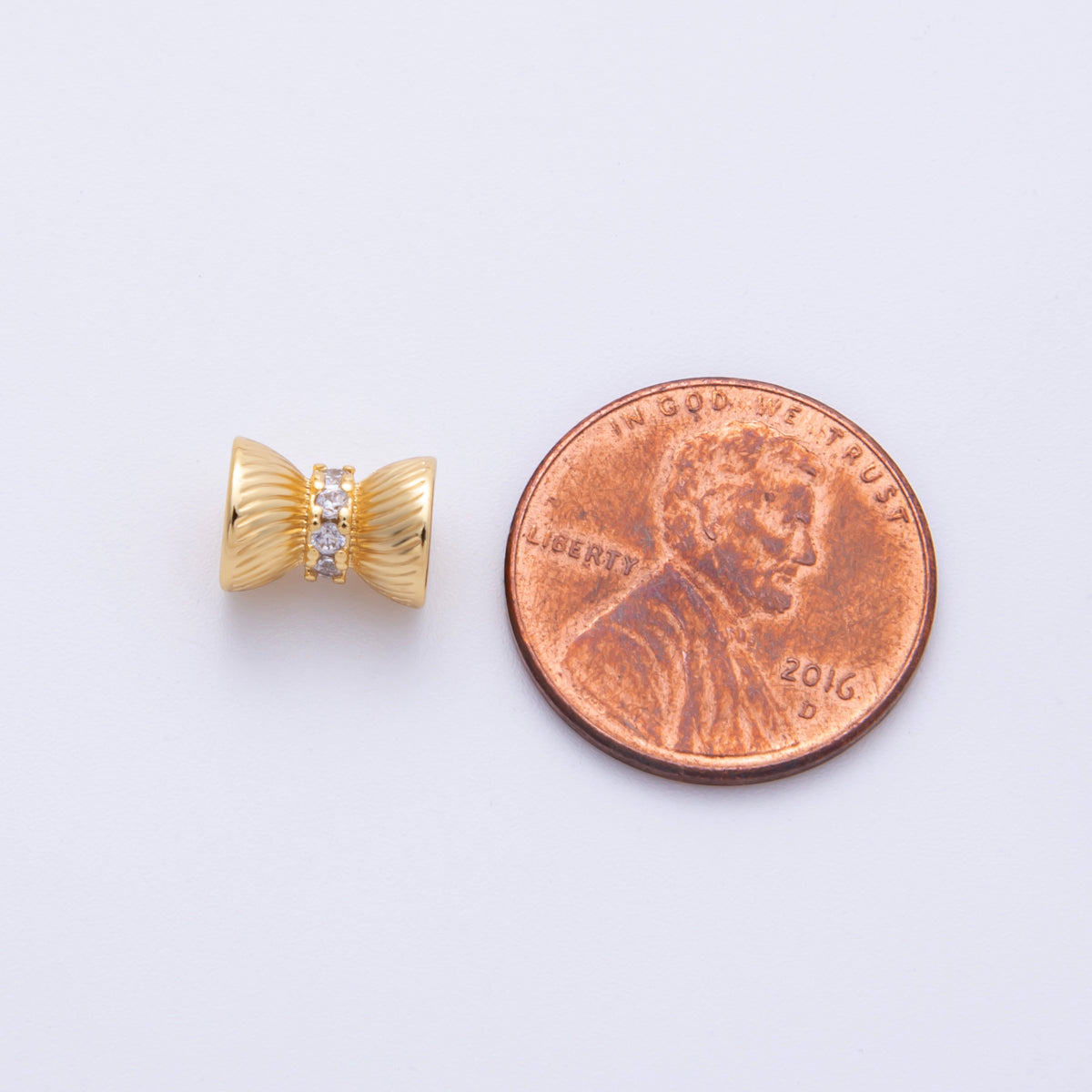 14k Gold Filled 9mm Clear CZ Ribbon Bow Textured Spacer Beads | Beads-200004
