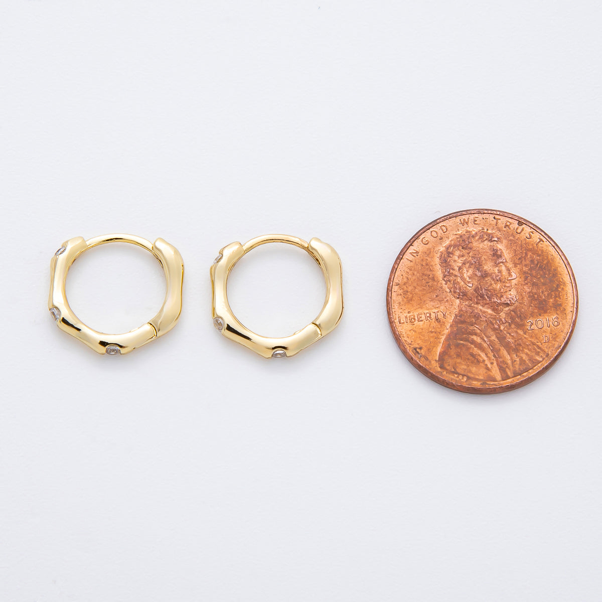 14K Gold Filled 13mm Clear CZ Dotted Wavy Molten Cartilage Huggie Earrings | AJ236