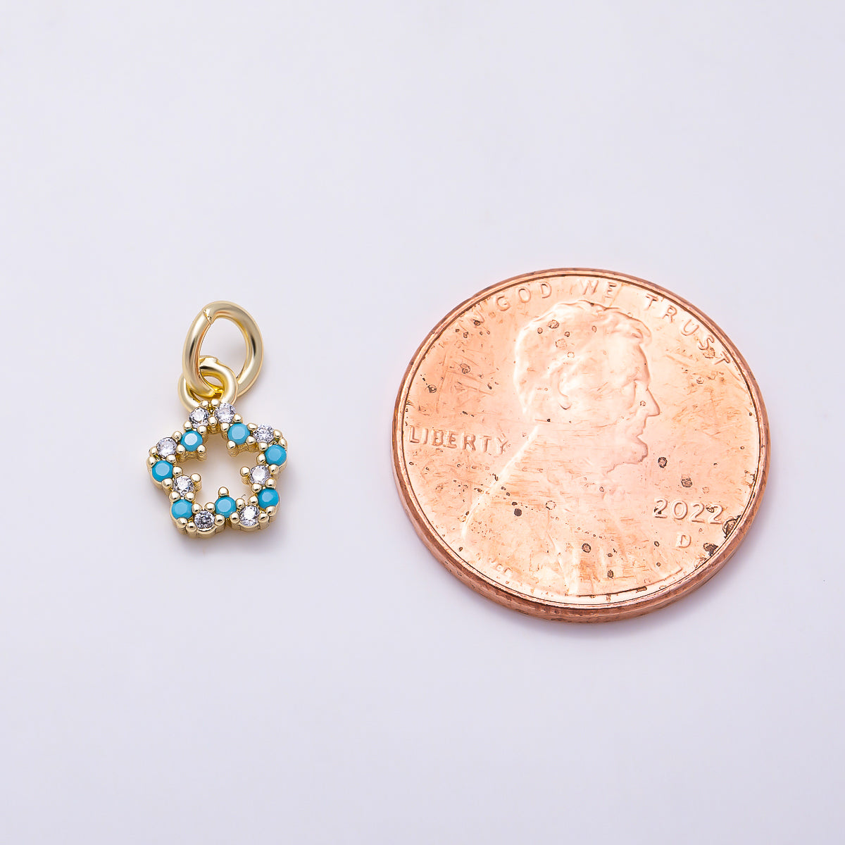 16K Gold Filled 9mm Blue Turquoise Clear Micro Paved CZ Open Celestial Star Charm | Charms-01621