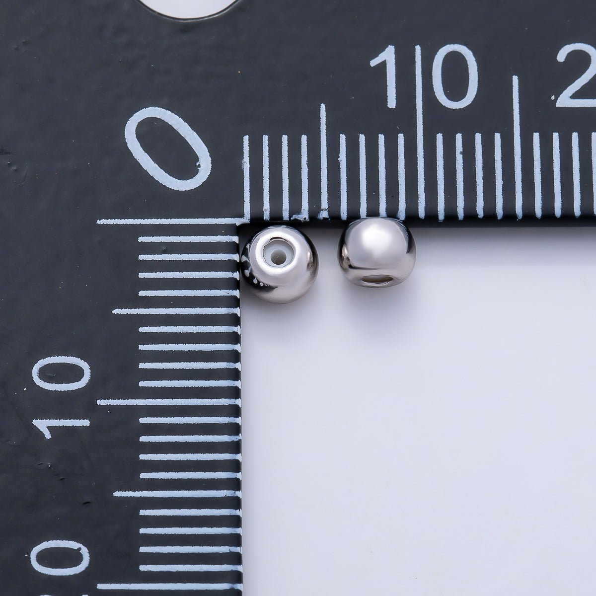 Rhodium Plated 4mm Silicone Rubber Slide Bead | Findings-00406 - DLUXCA