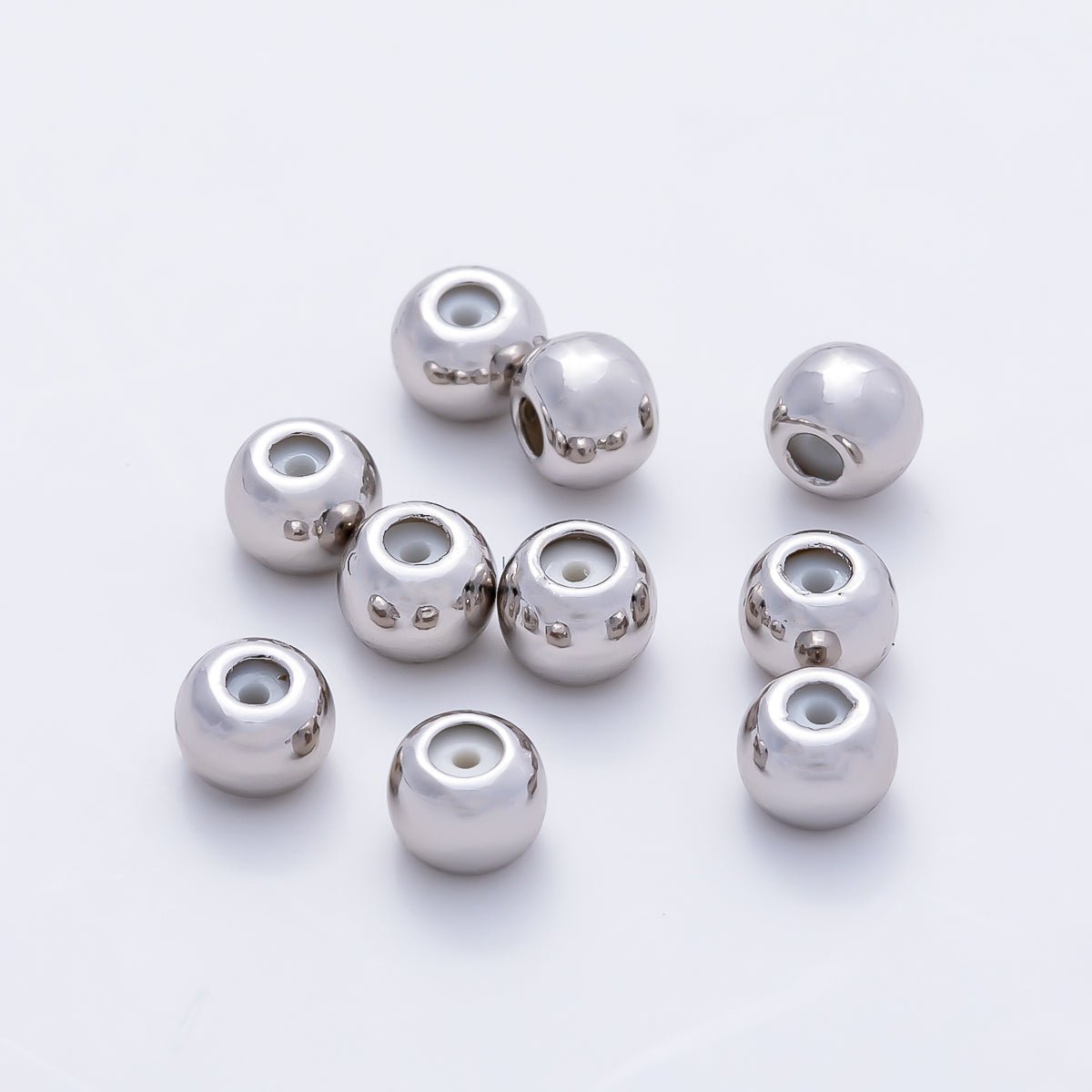 Rhodium Plated 4mm Silicone Rubber Slide Bead | Findings-00406 - DLUXCA