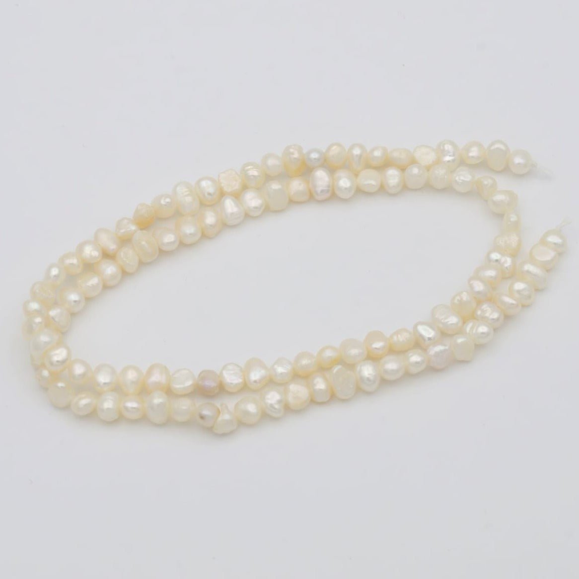 3.4-5.8mm AAA Tiny Seed Natural White Potato Freshwater Pearl Beads Genuine Tiny Freshwater Pearl Beads | WA-815 Clearance Pricing - DLUXCA