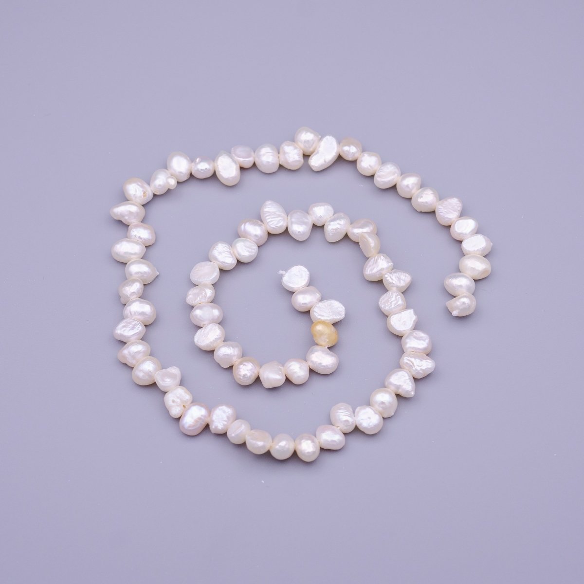 6.7mm - 7.6mm Nugget Seed White Natural Freshwater Pearl 71pcs Full Strand | WA-1317 Clearance Pricing - DLUXCA