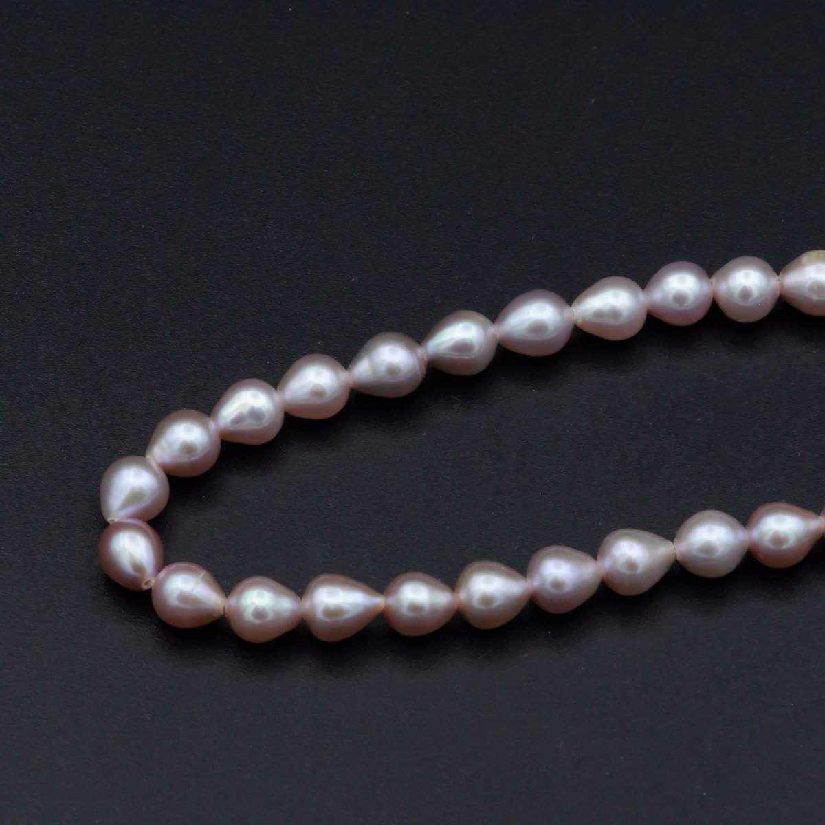 AAA 5.5mm Pink Champagne rice freshwater pearl teardrop pearl per Strand Wholesale Bulk | WA-564 Clearance Pricing - DLUXCA