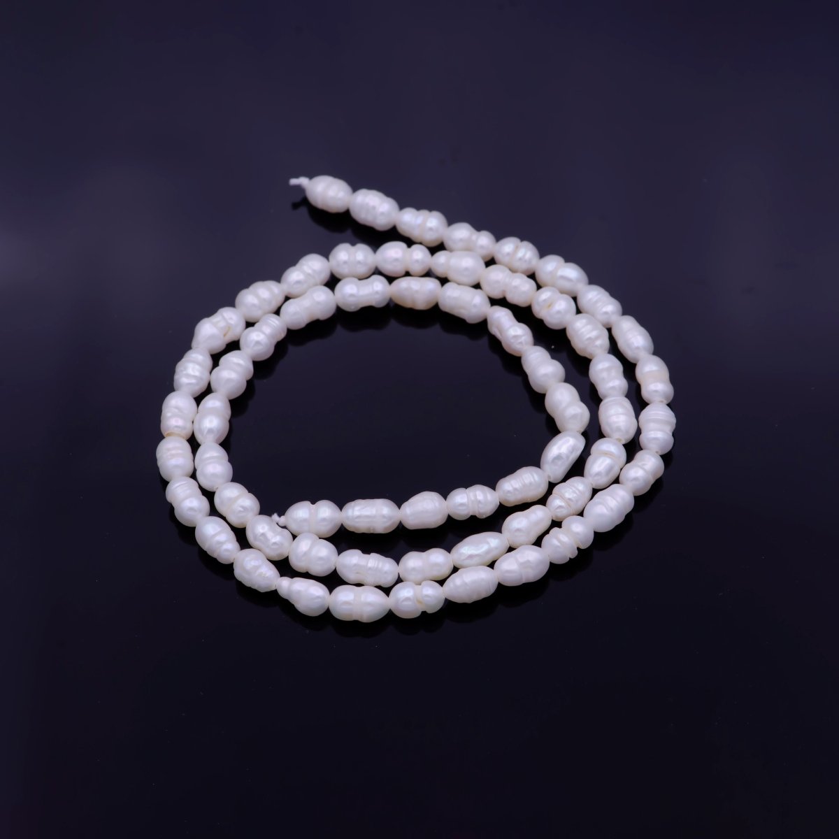 AAA Natural Freshwater Pearl 5.8mm x 4mm Beads 61 Pieces per Strand | WA-1331 Clearance Pricing - DLUXCA