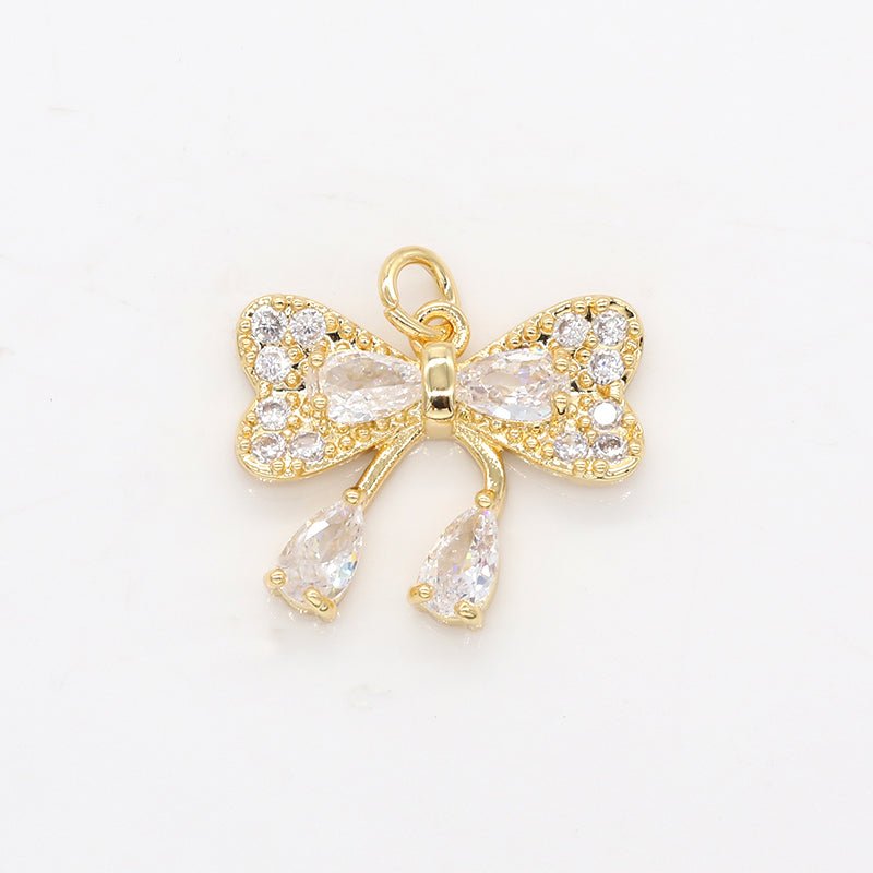 Golden Crystal Bowtie Charm CZ Gold Plated Clothing Ribbon Micro Pave Charm Pendant GP-249 - DLUXCA