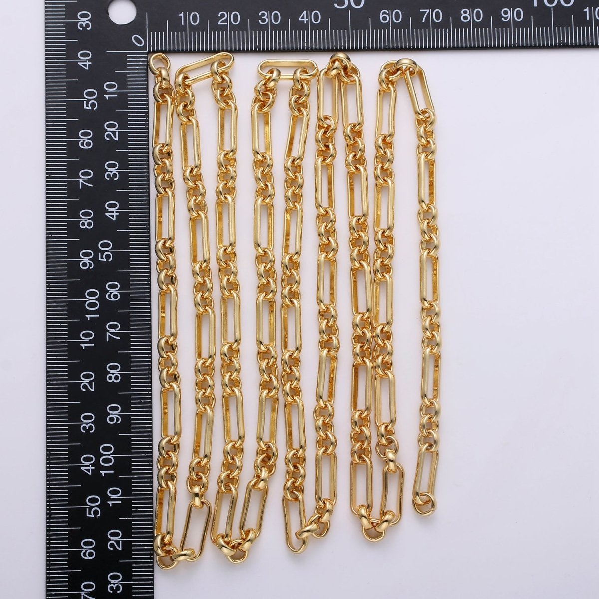 OS 24K Gold Filled Chain By Yard, Figaro Fancy Long and Short Unfinished Chain, Wholesale Bulk Roll Chain For Jewelry Making, Size 12x5mm | ROLL-233 Clearance Pricing - DLUXCA